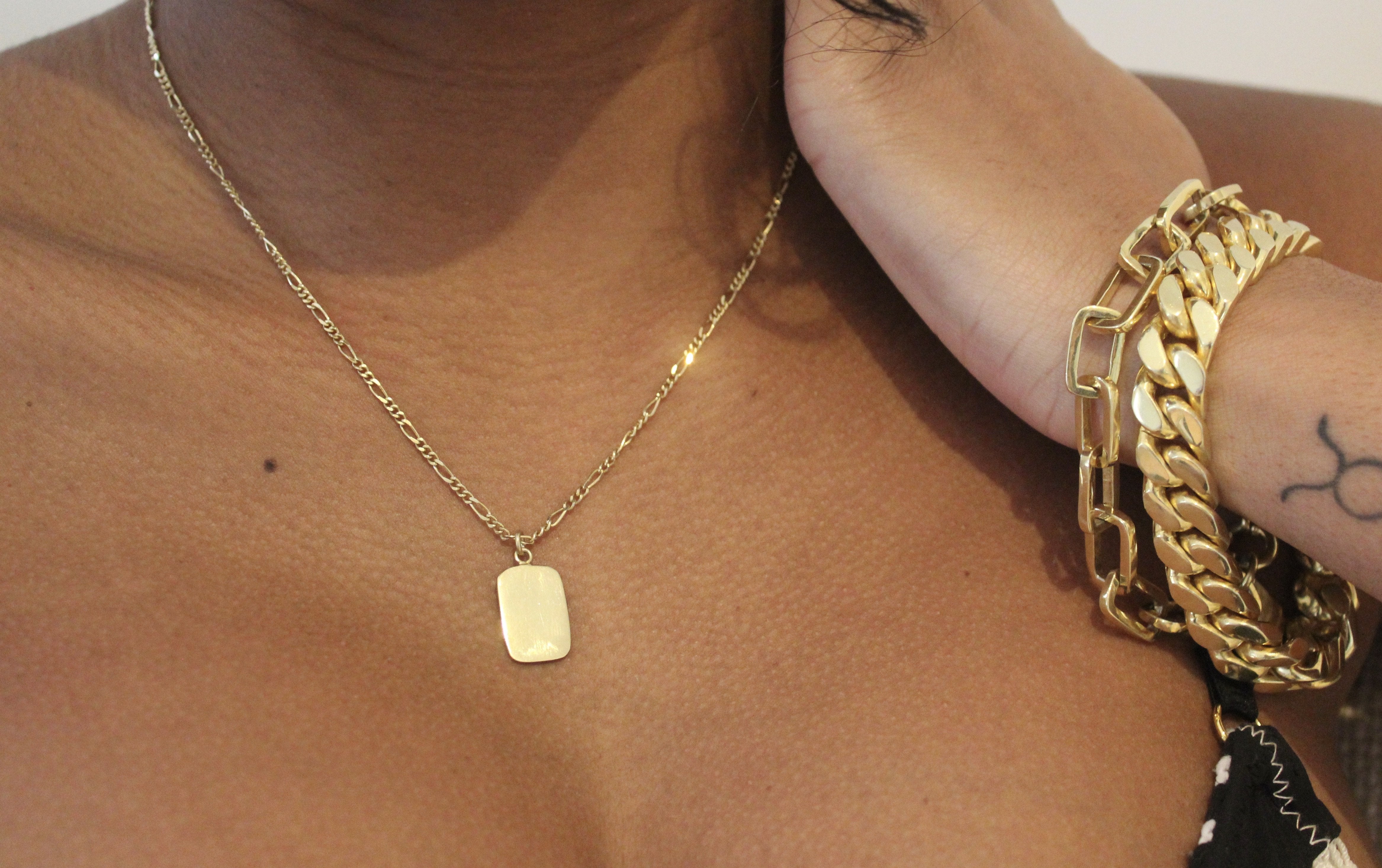 Gold chain with dog shop tag